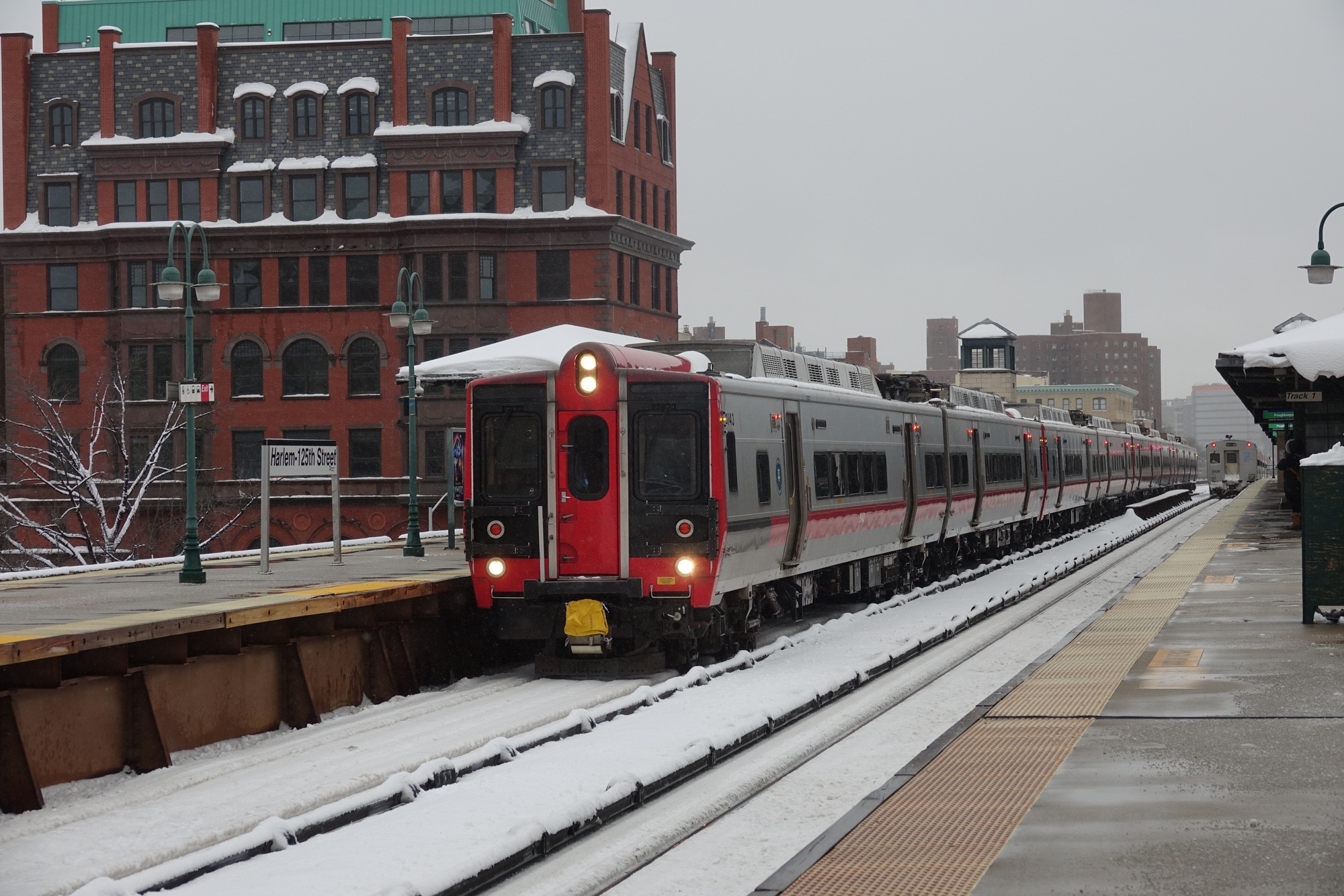 A Metro-North M8 at a snowy Harlem-125th Street station